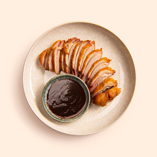 Pato asado en salsa especial